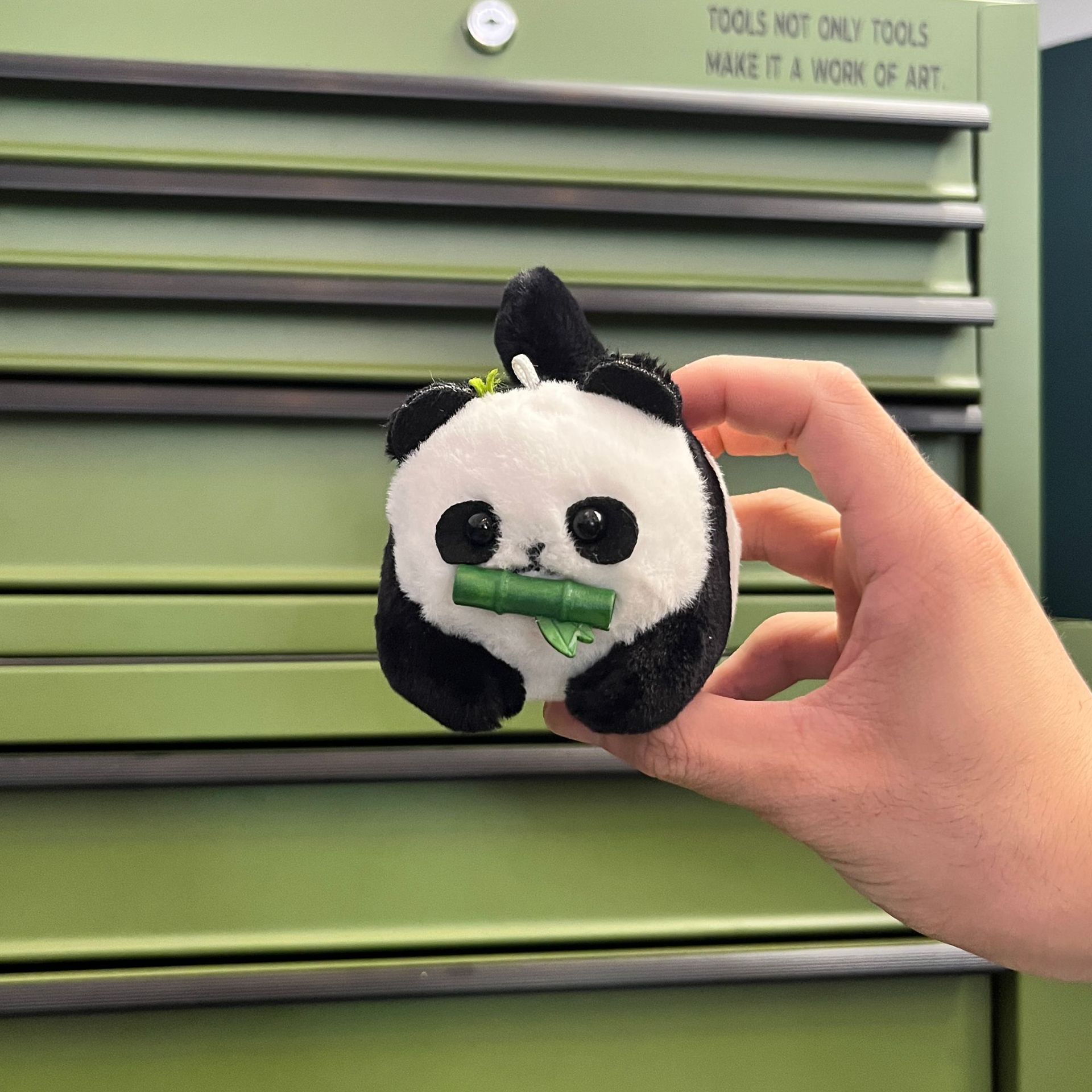 black tail wagging giant panda