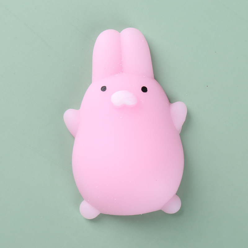 Conejo rosa feliz