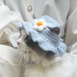 Knitted blue flower cap
