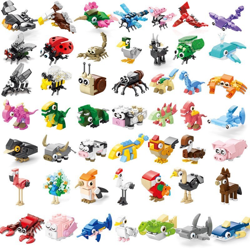 Scatola piccola assortita con animali e insetti.