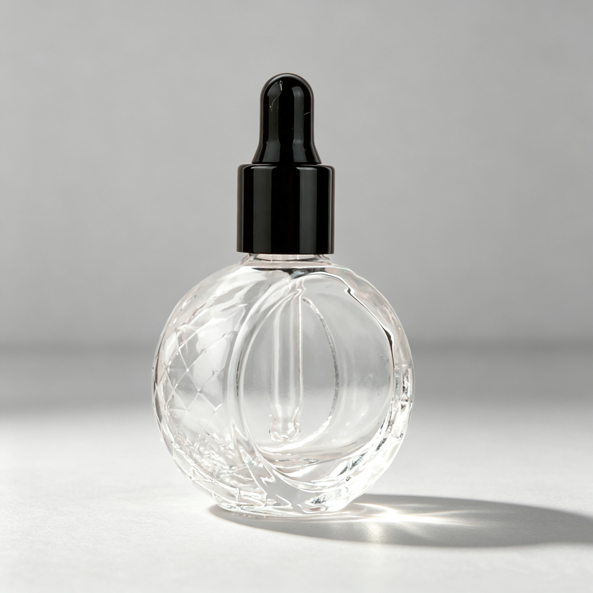 clear bottle + black dropper