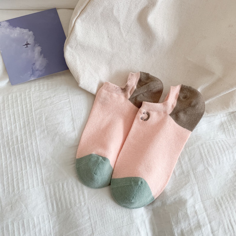 Cuerpo de calcetines rosa.