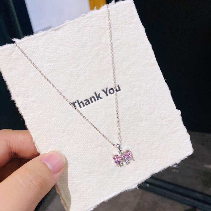 D11 silver pink diamond bow