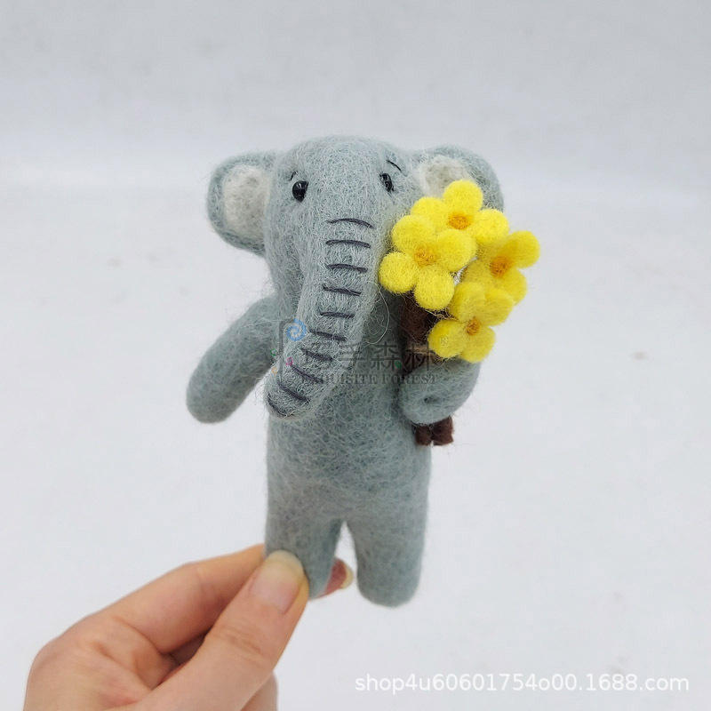 Elephant holding a cauliflower