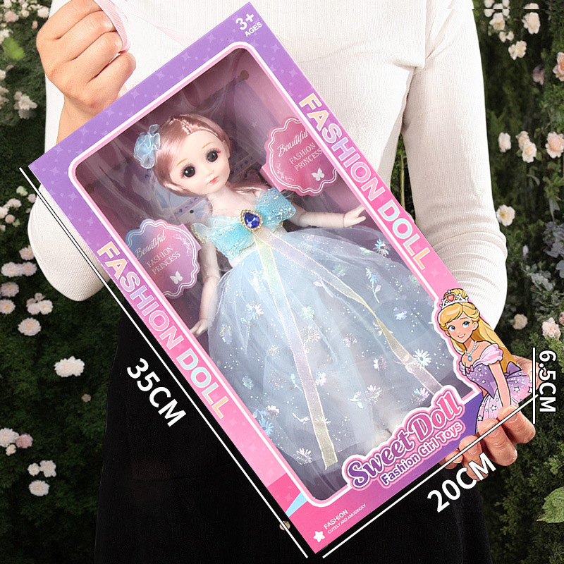 Caja portátil de 35 cm - Falda de gasa azul - Muñeca de 30 cm