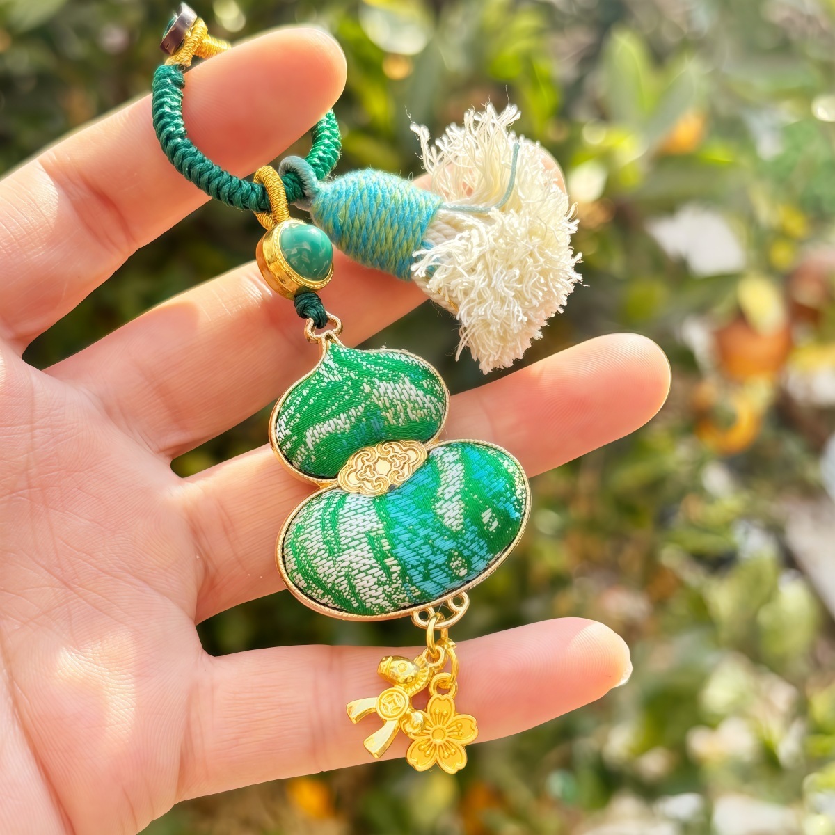 pompon en fil de coton bambou émeraude