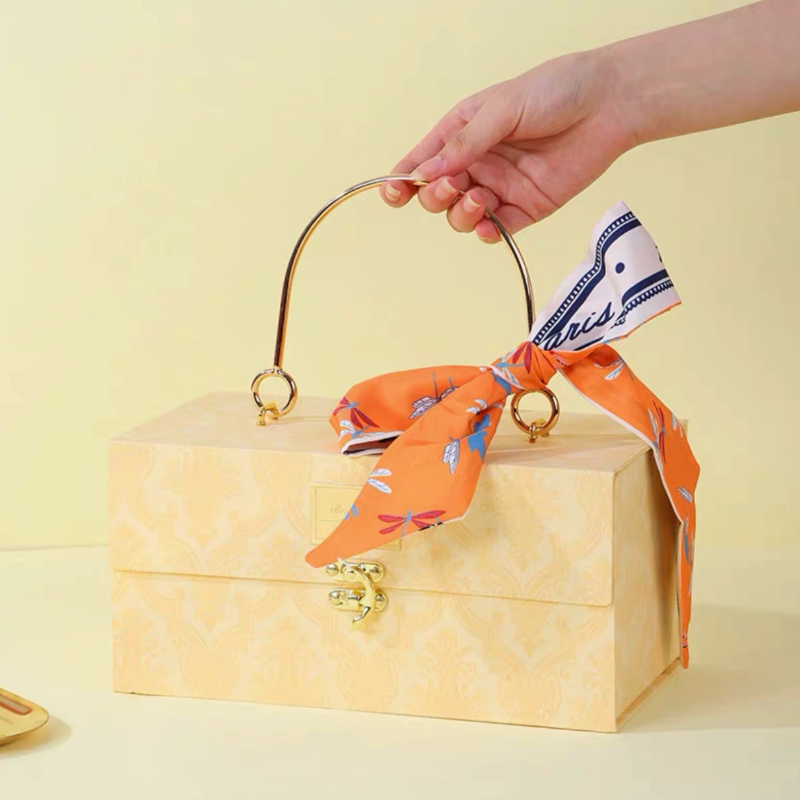 Champagne-colored gift box + raffia + silk scarf