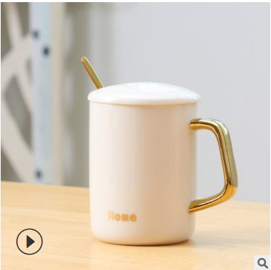 White mug lid spoon