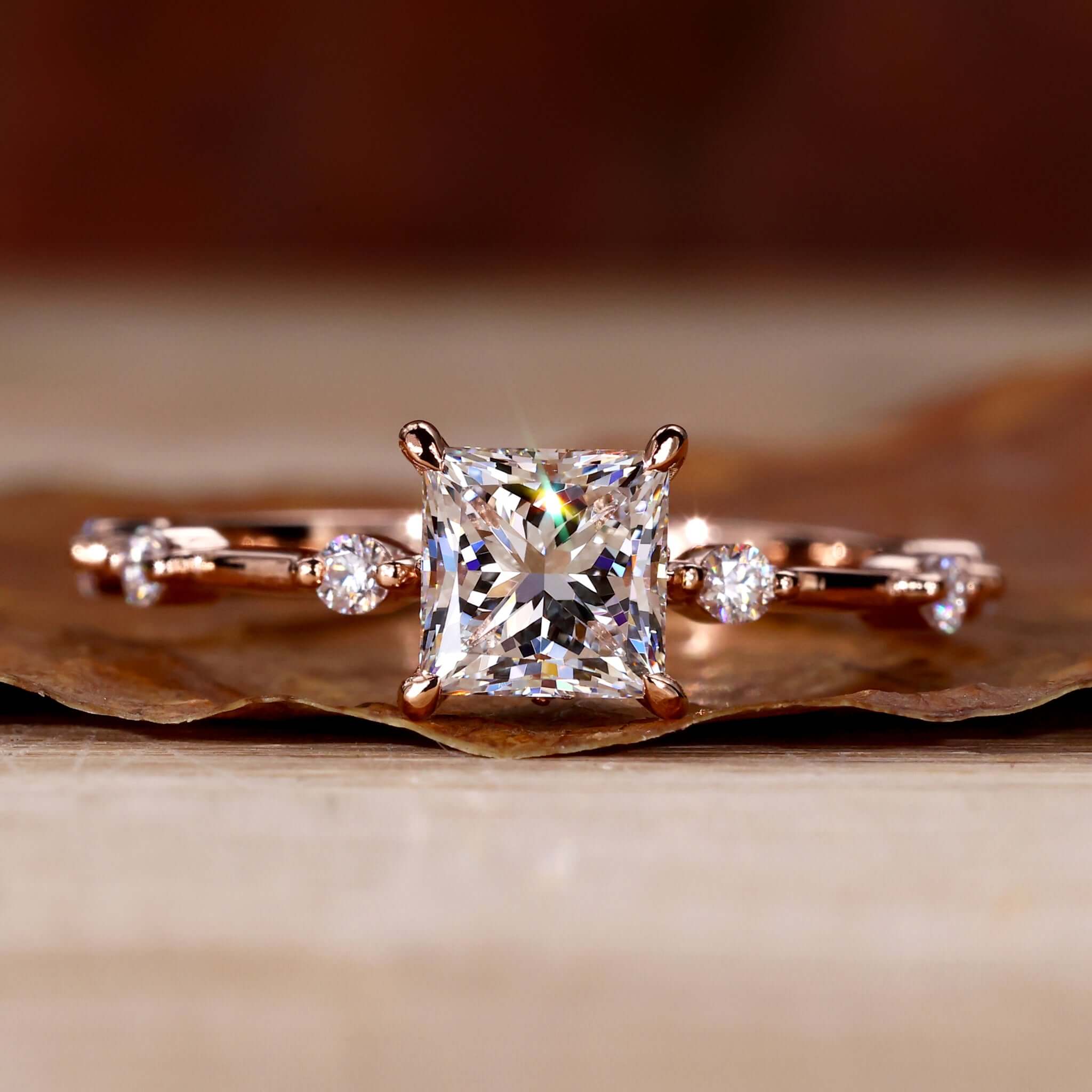 princess side-stone ring