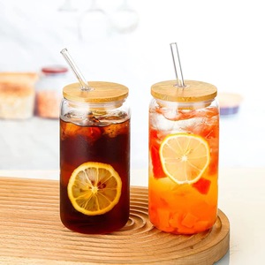 カスタムリビーティーコーヒー飲用ガラスカップソーダビールは、ジュースミルク用の竹の蓋とストローでガラスマグを形作ることができます