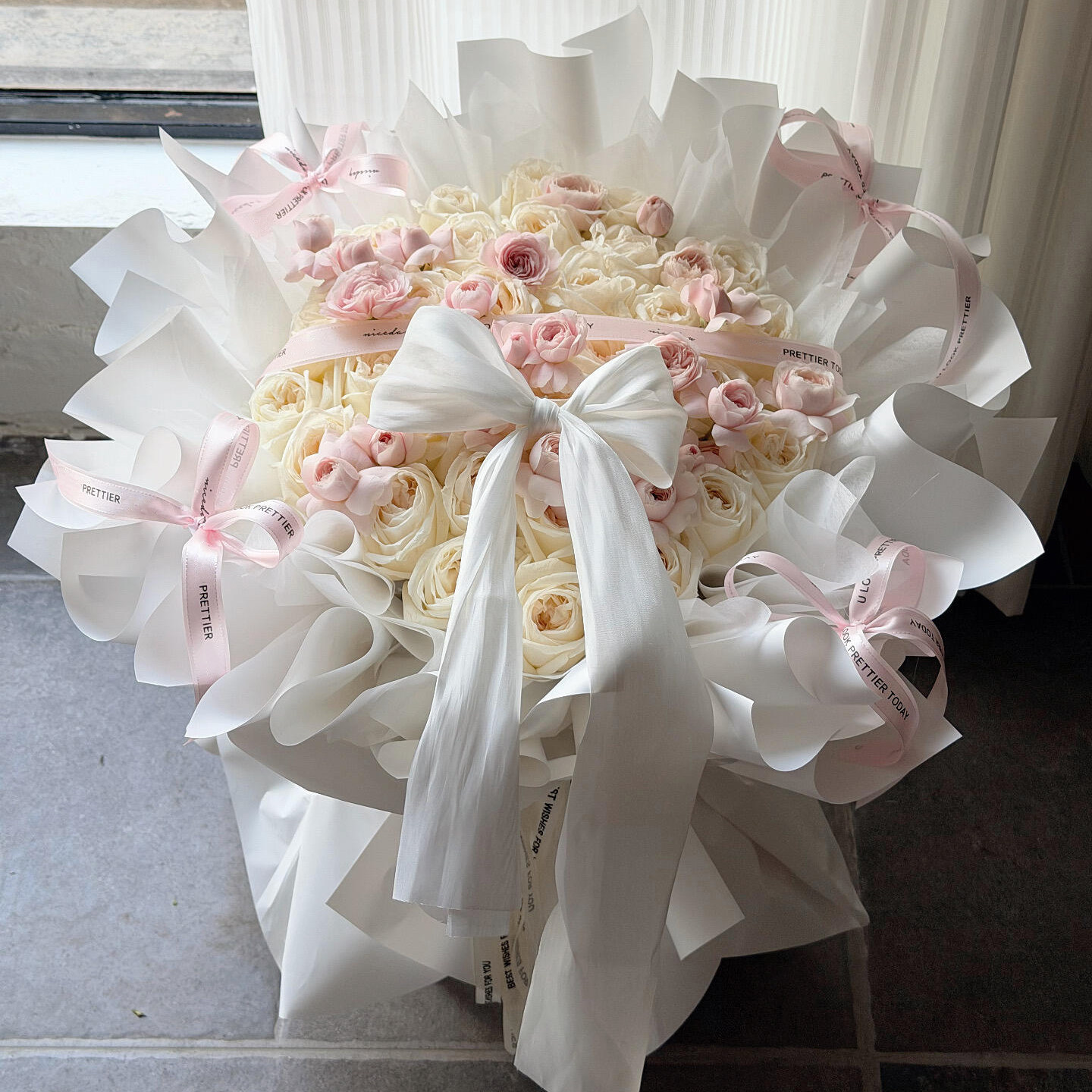 light cherry meets softness-hug bucket-52 mixed flowers