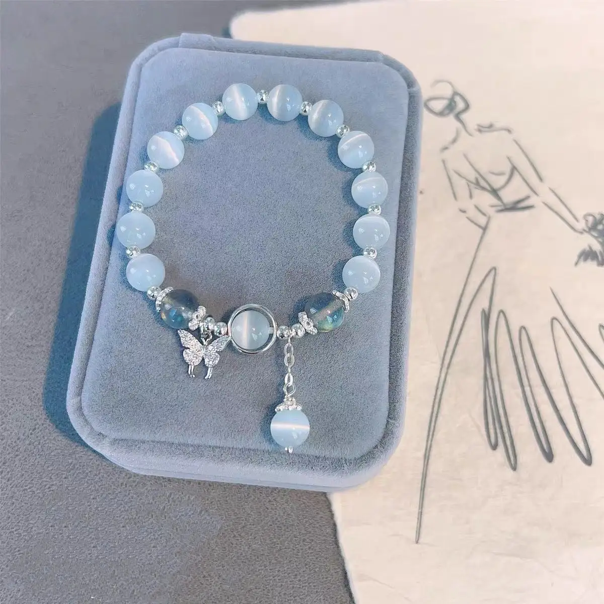 Großhandel Kristall Armband Diy Charm Design Cat Eye Charms Quaste Schmetterling Armband Kristall Perlen Armband für Frauen