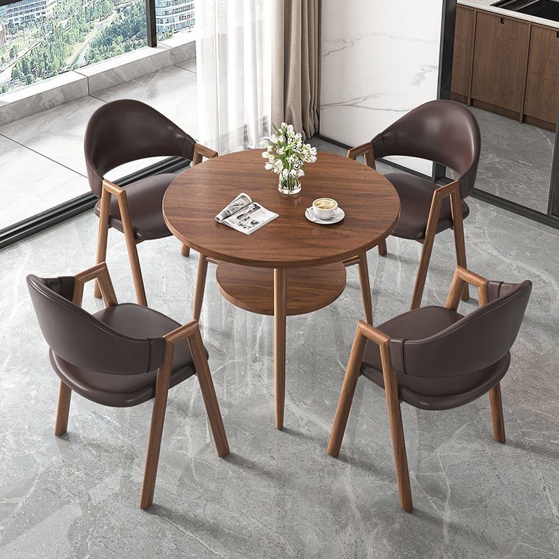 Round table + 4 dark brown leather chairs-walnut-colored legs