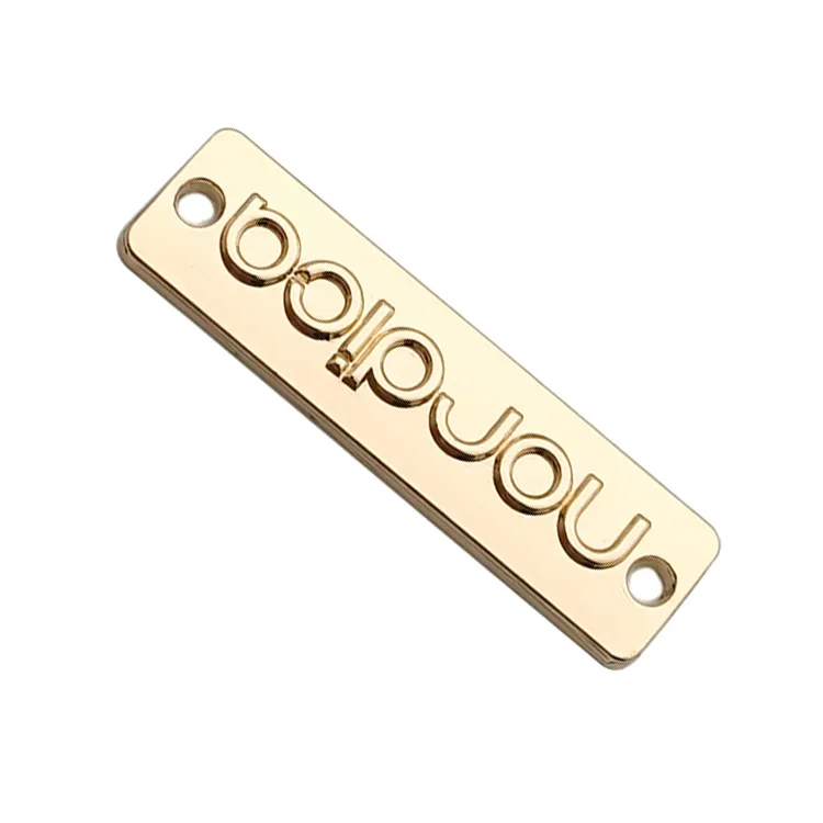 Precio de fábrica ropa grabada etiqueta de metal logotipo personalizado etiqueta de metal placa para ropa de baño