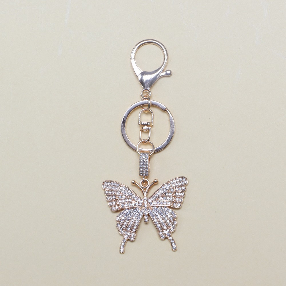 Mosquetón grande mariposa dorada