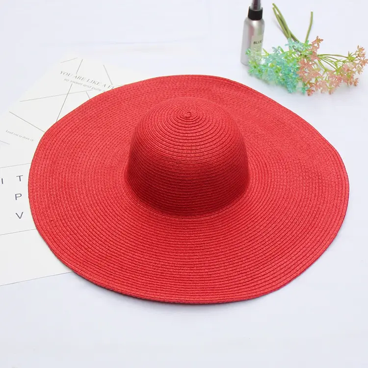 Logo personalizzato accettabile all'ingrosso estate Sombreros signora tesa larga carta floscio cappello di paglia sole cappello da spiaggia pieghevole a buon mercato cappello di paglia da donna