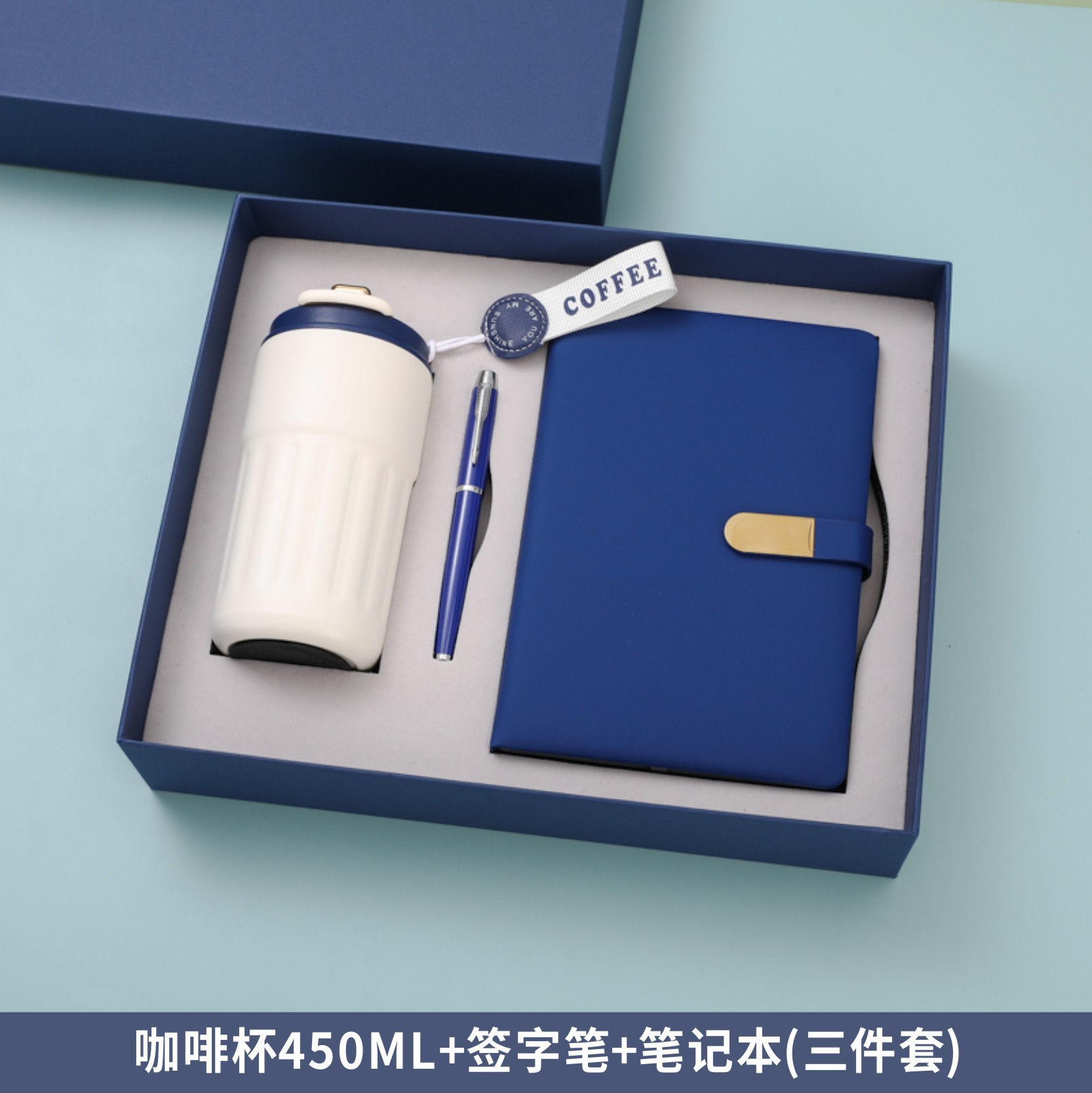Tasse à café-stylo-cahier-bleu