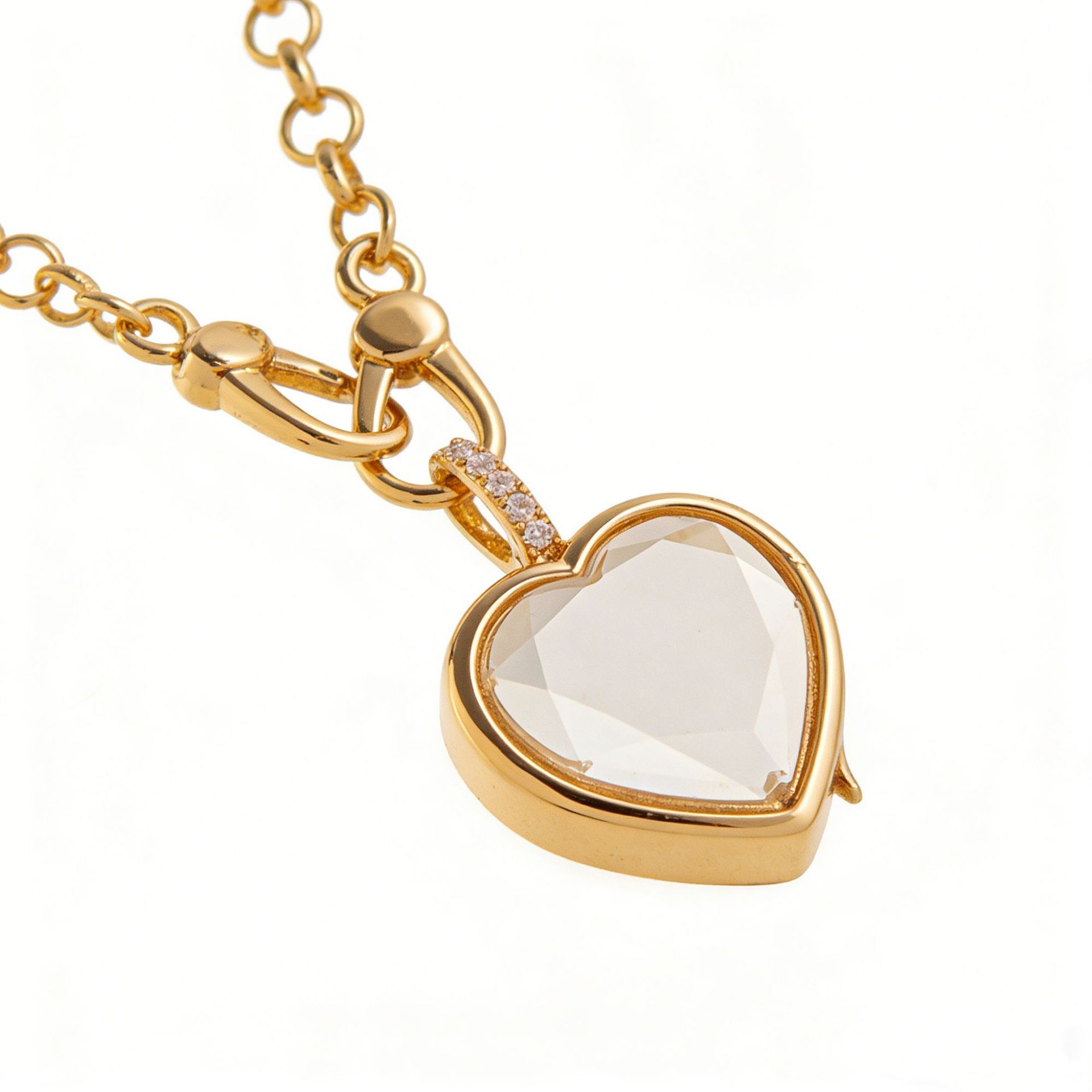 Collana con pendente trasparente a forma di cuore in oro