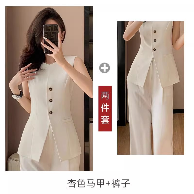 apricot vest and wide-leg pants