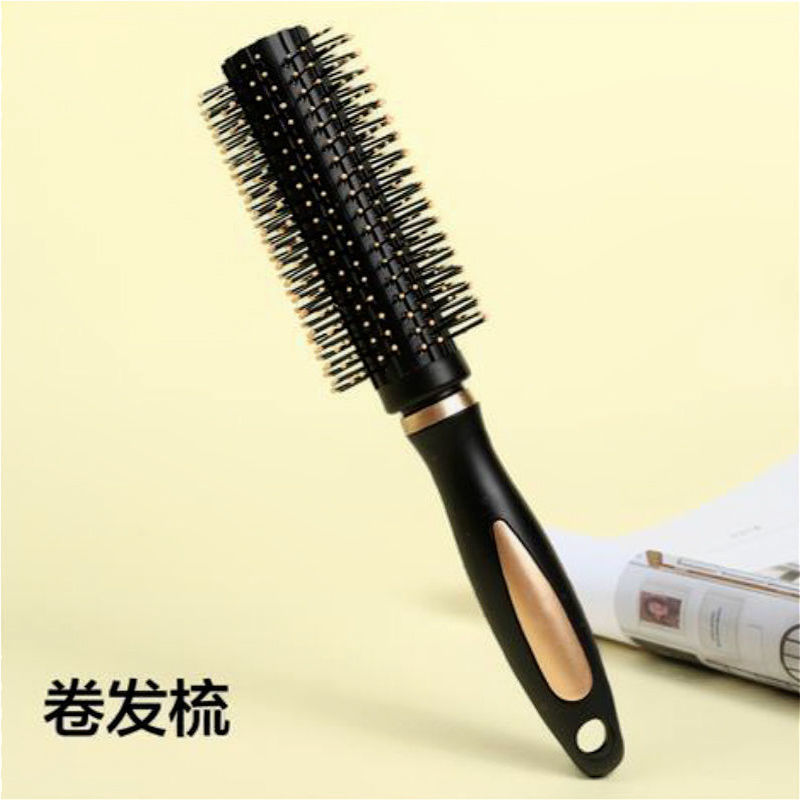 Peine para cabello rizado negro y amarillo.
