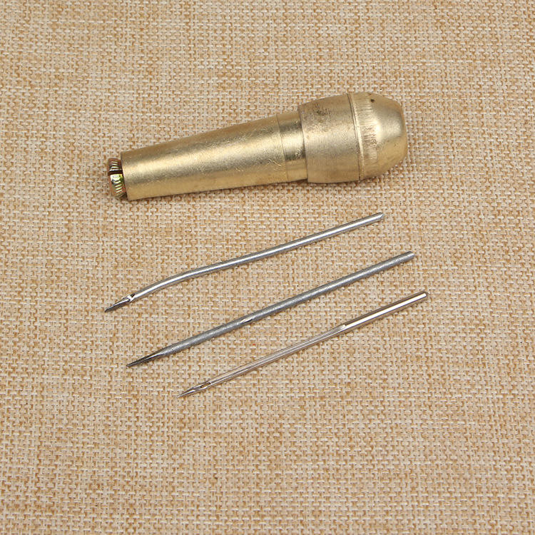 3 aiguilles + manche en cuivre