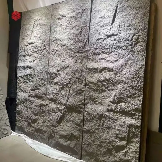 Panel de pared de piedra PU avanzado con sentido de alta calidad para protección del medio ambiente y verde para materiales de decoración de sala de estar del hogar