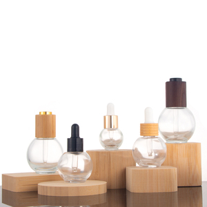<strong>Empty</strong> Ball Shape Round clear Cosmetic Glass 30ml 50ml Essential Oil <strong>Bottles</strong> with <strong>Dropper</strong> Cap White Rubber Top with Cuticle Oil - Product Image 2