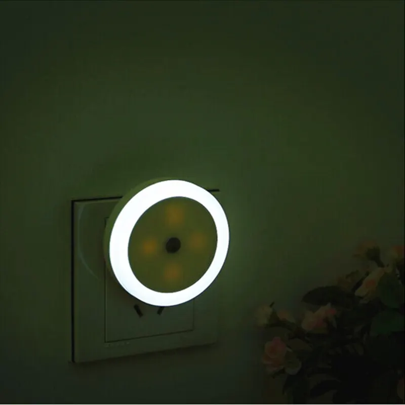 Tocca la luce notturna a LED Plug-in Smart crepuscolo all'alba sensore luci notturne automatiche