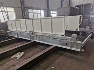 Plataforma de carga y descarga retráctil para transporte de material