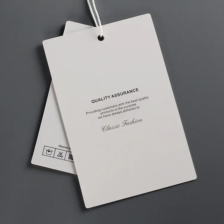 Venta caliente impreso logotipo personalizado papel Etiqueta Privada ropa etiqueta colgante papel recubierto marca etiquetas colgantes