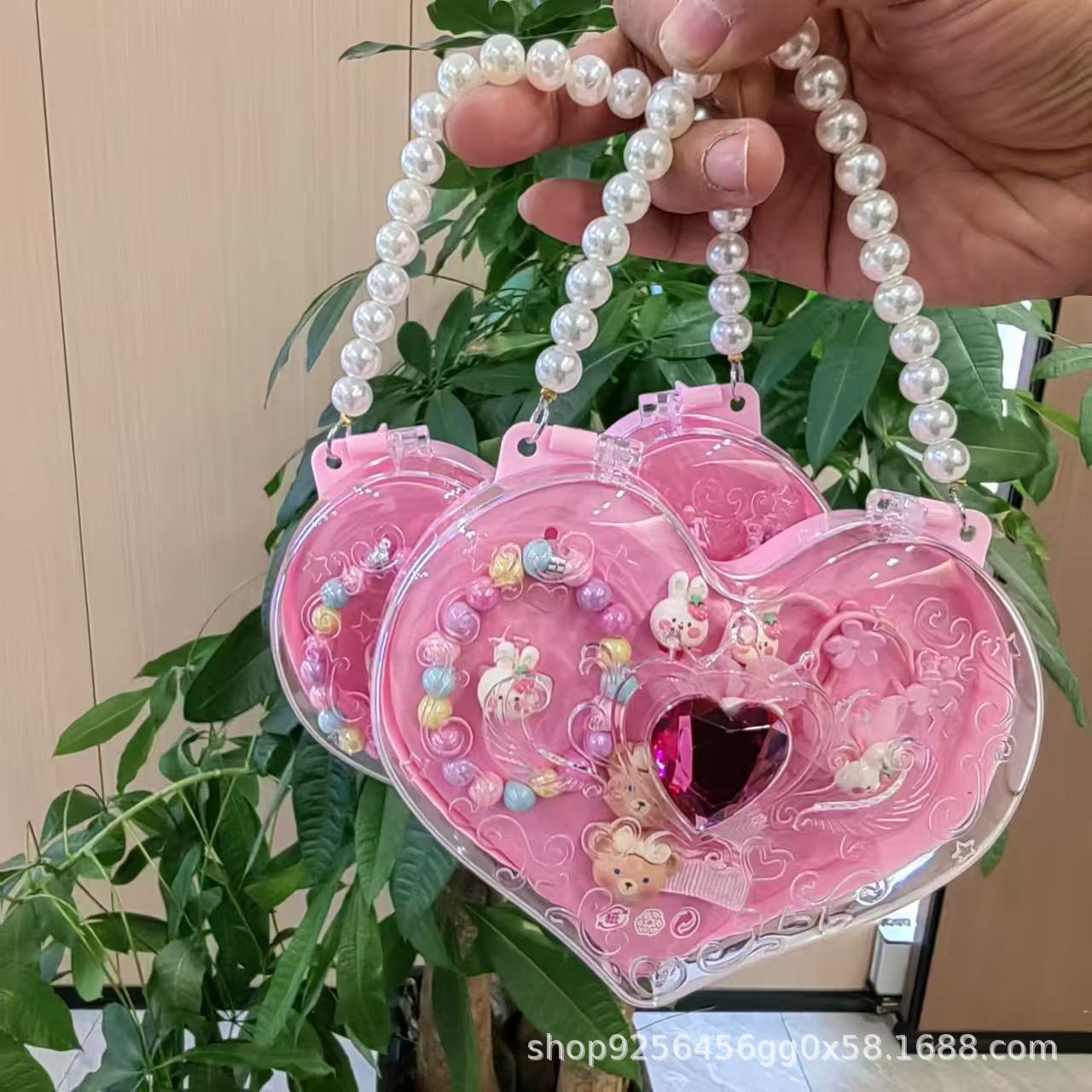 Boîte en forme de coeur-bijoux aléatoires