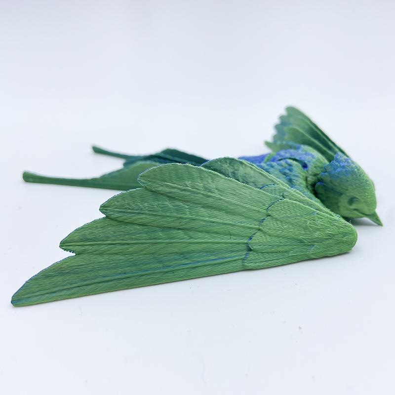 Blue-green swallow 15cm long