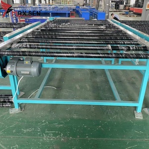 Máquina de carga de alta calidad, transportador de rodillos motorizado, transportador de rodillos accionado por cadena para transporte de cesta de rotación - Product Image 2