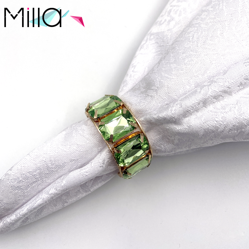 Bague en or + strass vert clair