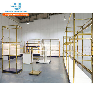 Kệ Trưng Bày Đồ Nội Thất Túi Kim Loại Màu Vàng Tùy Chỉnh Giá Trưng Bày Đá Cẩm Thạch Treo Tường Trung Tâm Mua Sắm Tùy Chỉnh Kệ Trưng Bày Cửa Hàng Hành Lý Du Lịch - Product Image 1