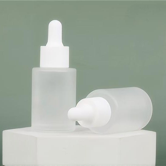 frosted bottle with white dropper