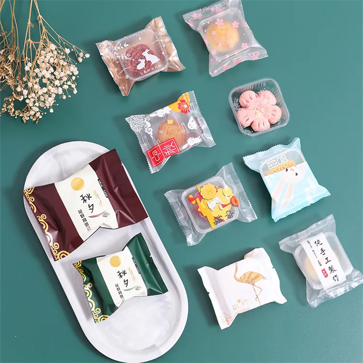 Wholesale plastic snack food packaging bag new frosted moon cake thickening machine sealing bag 50-100g cute moon cake bag