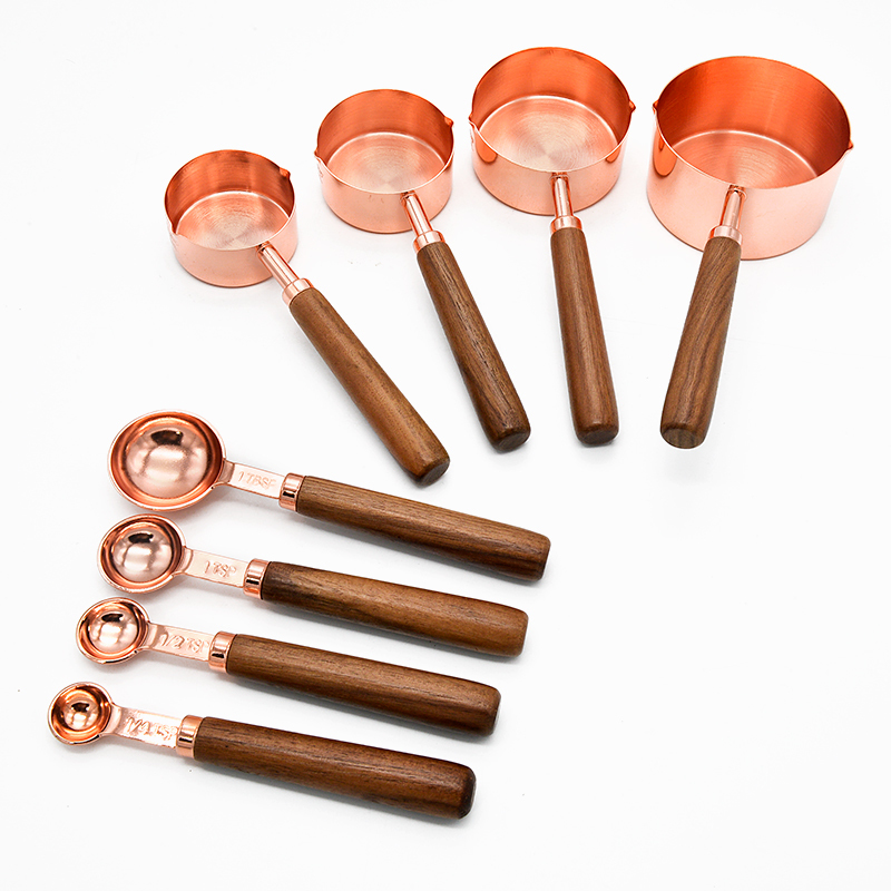 Ensemble de 8 tasses et cuillères or rose
