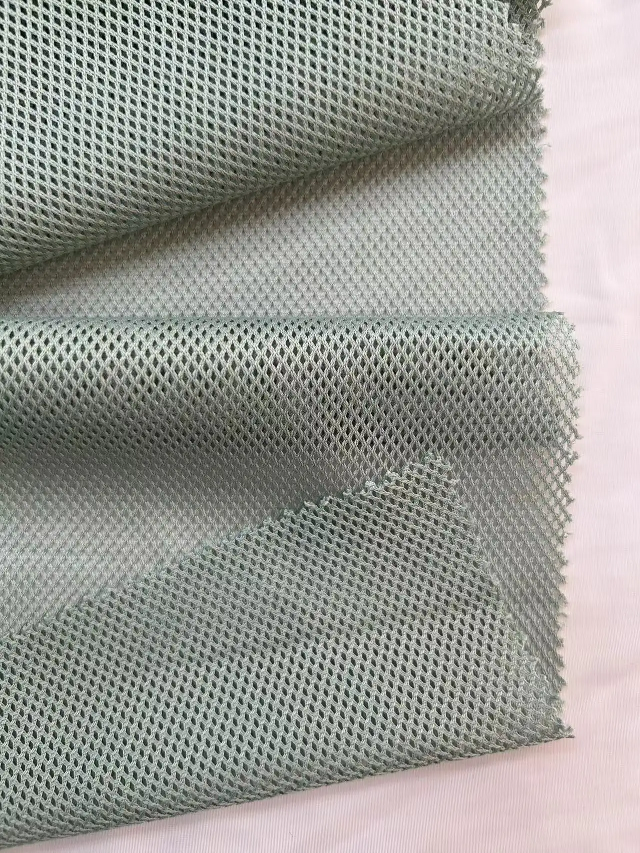 Siyuanda Chất Liệu Mới Polyester Vải Thoáng Khí Thể Thao Lưới Dệt Kim Vải Cho Quần Áo