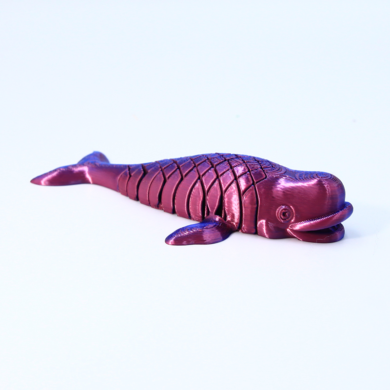 Ballena roja y azul de 12 cm.