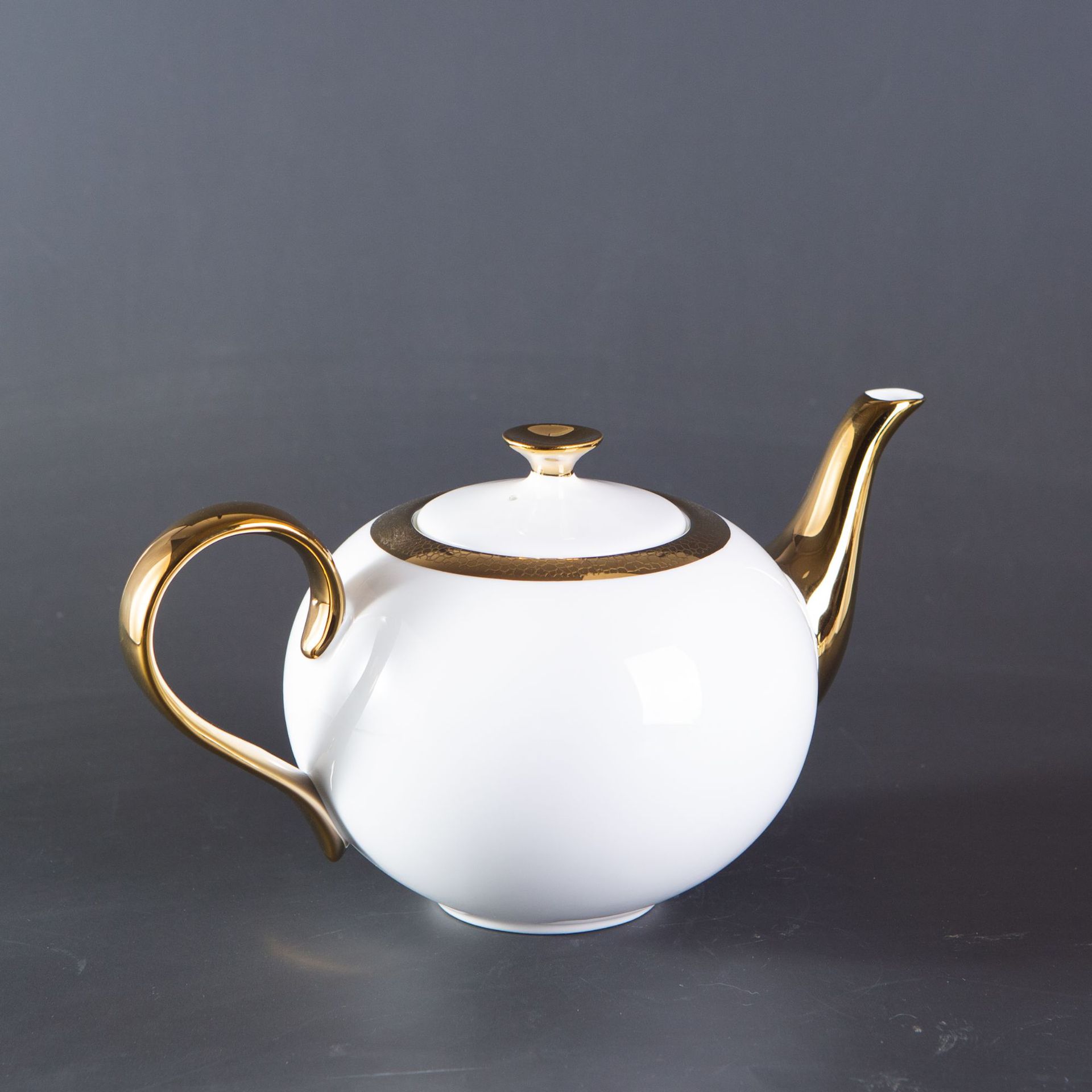 Théière en or