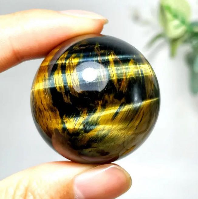 Yellow tiger eye sphere