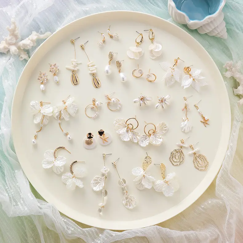 Pendientes de perlas de concha de estrella de mar dulce y fría para mujer, aretes de temperamento femeninos