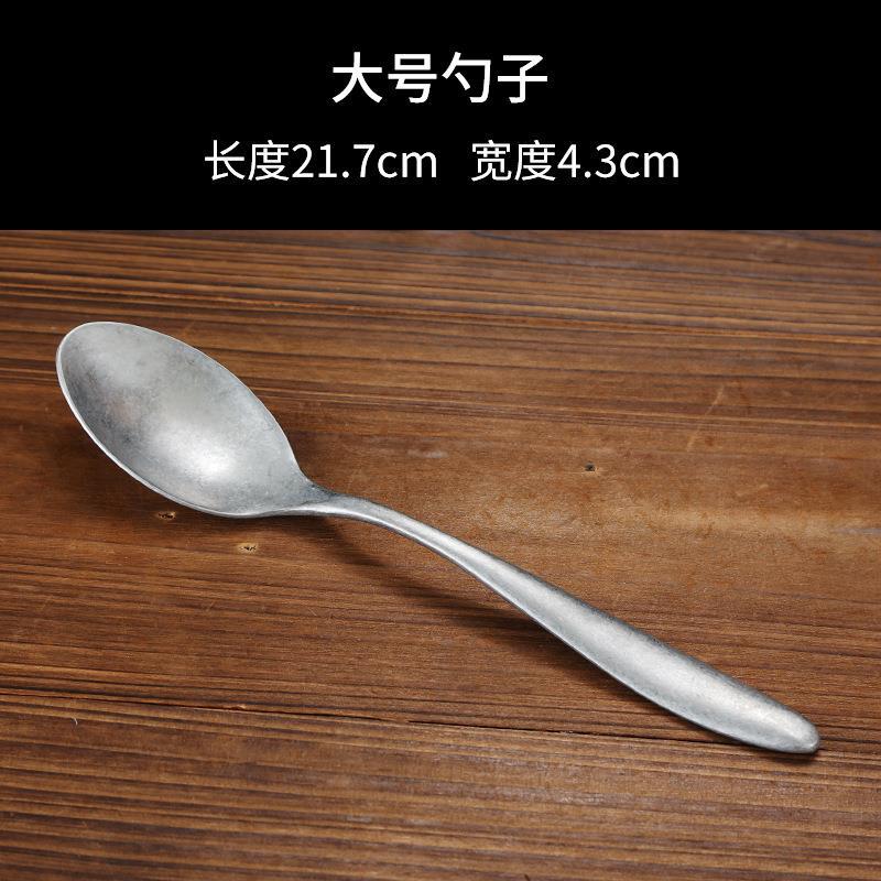 Rounded handle for main serving spoon (snowflake-shaped)