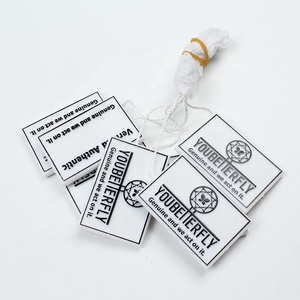 Cadena de etiqueta colgante de plástico con logotipo en relieve personalizado a granel con cuerda de nailon - Product Image 1
