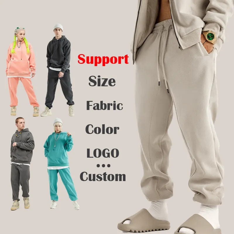 Toptan yüksek kalite gevşek fit pantolon özel logo pantolon sokak giyim boy sweatpants erkek koşucu pantolonu