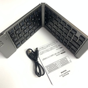 The Mini <strong>Wireless</strong> <strong>Numeric</strong> <strong>Keypad</strong> Can Be Folded in Half for Convenient Carrying - Product Image 2