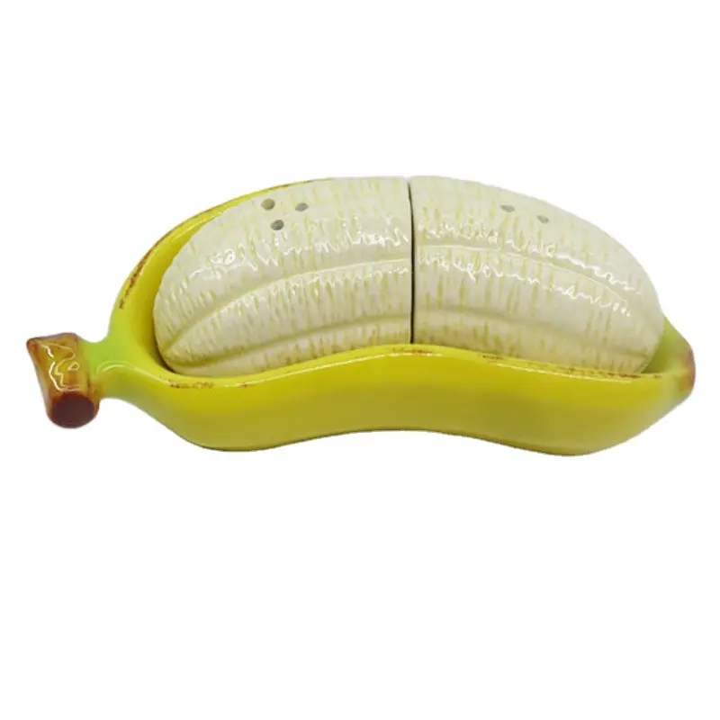 A buon mercato carino frutta a forma di banana in ceramica sale pepe Shaker in ceramica per la casa e il ristorante uso olio aceto salsa pentola