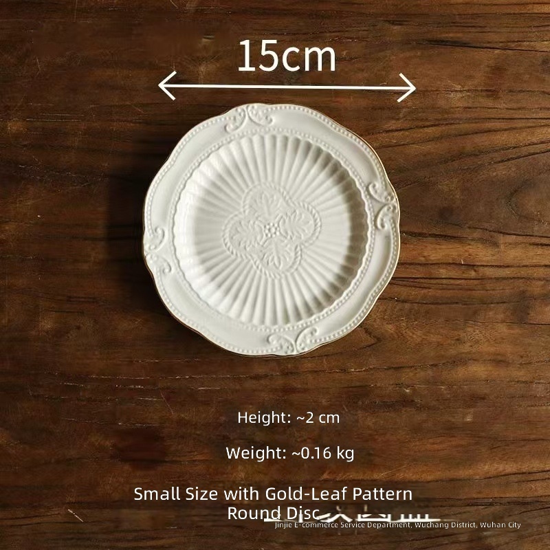 Small gold-embossed leaf pattern disc