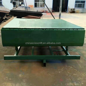 Nivelador de muelle estacionario personalizado de fábrica de 5T-15t de carga para carga y descarga de contenedores a buen precio - Product Image 1